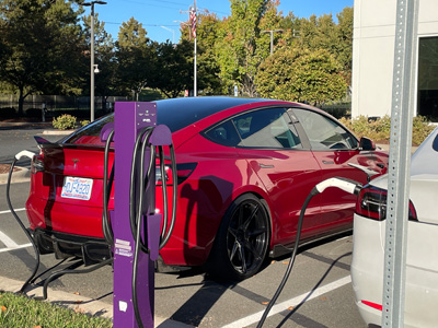 Tesla being charged on Atom Power EVSE